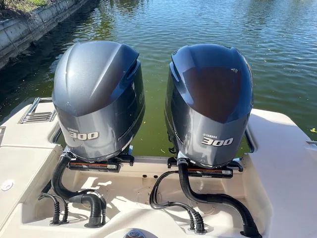 Slide: The Image of Two Yamaha 300 outboard engines on a Grady-White 325 Freedom boat. - 11