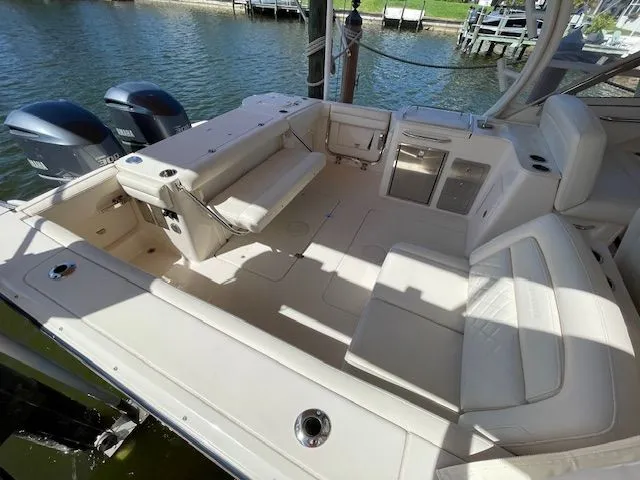 Slide: The Image of 2021 Grady-White 325 Freedom boat with spacious deck and dual engines. - 12