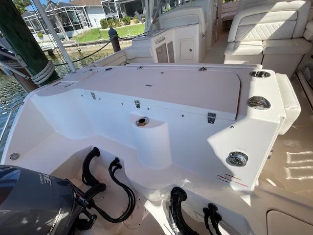 Slide: The Image of Interior view of a 2021 Grady-White 325 Freedom boat. - 13