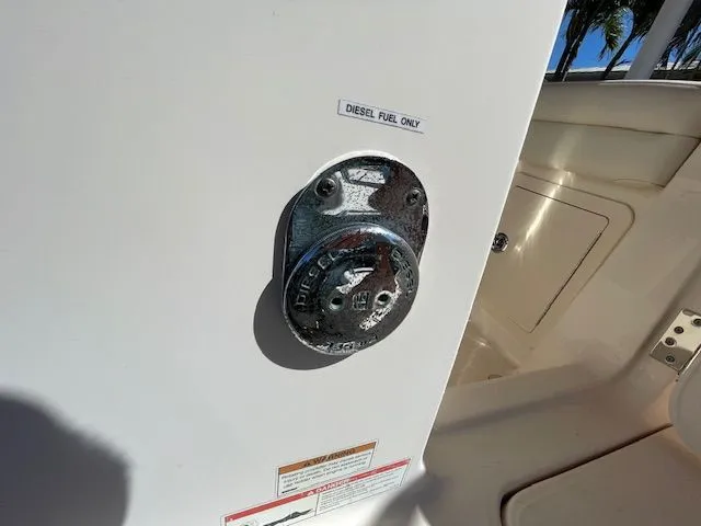 Slide: The Image of Diesel fuel cap on a 2021 Grady-White 325 Freedom boat. - 14