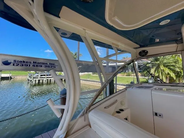 Slide: The Image of Interior of a 2021 Grady-White 325 Freedom boat at dock. - 35