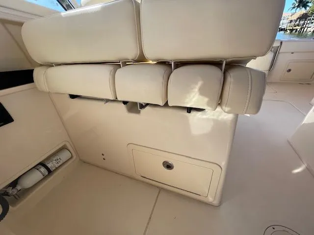 Slide: The Image of Interior of Grady-White 325 Freedom boat, seating area and storage. - 42