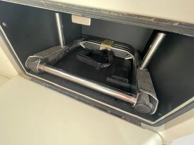 Slide: The Image of Folded ladder in Grady-White 325 Freedom boat, 2021 model. - 44