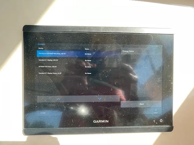 Slide: The Image of Garmin device on Grady-White 325 Freedom boat, 2021 model. - 48