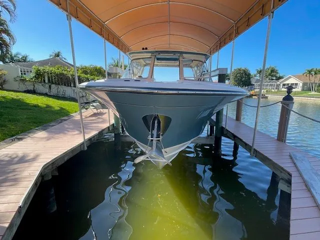 Slide: The Image of Grady-White 325 Freedom boat docked, 2021 model. - 8