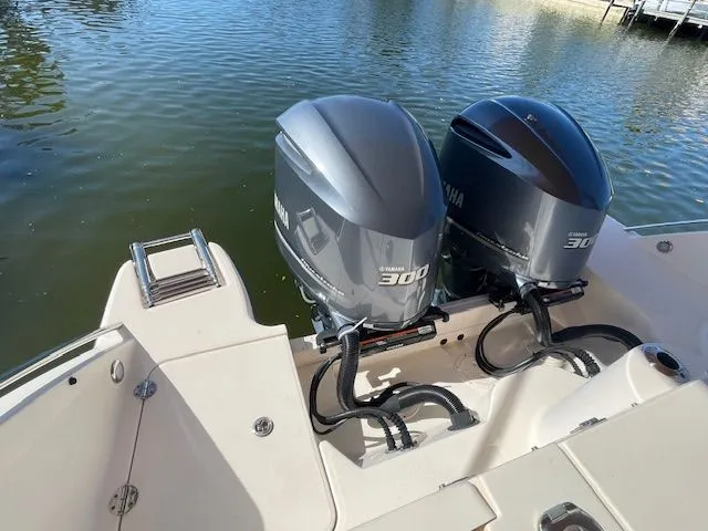 Slide: The Image of 2021 Grady-White 325 Freedom with Yamaha 300 engines by the water. - 9