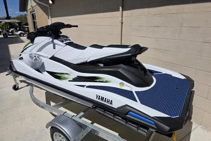 Slide: The Image of 2026 Yamaha WaveRunner VX Deluxe on trailer, sleek design, white and black color scheme. - 5