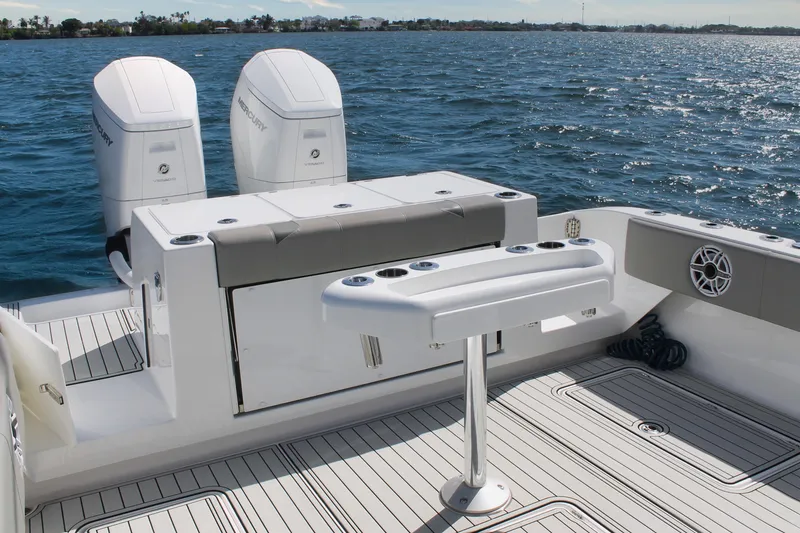 Slide: The Image of 2024 Cape Horn 39 T boat with dual Mercury engines on a sunny day. - 11