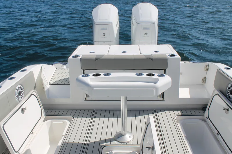 Slide: The Image of 2024 Cape Horn 39 T boat deck with seating and storage, on open water. - 12