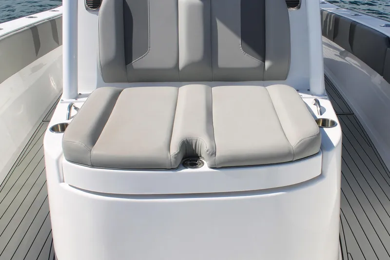 Slide: The Image of 2024 Cape Horn 39 T boat with cushioned seating and sleek design. - 21