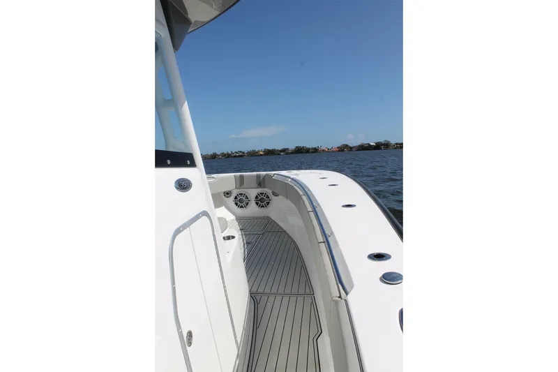 Slide: The Image of 2024 Cape Horn 39 T boat on water, showcasing sleek deck design and ocean view. - 24