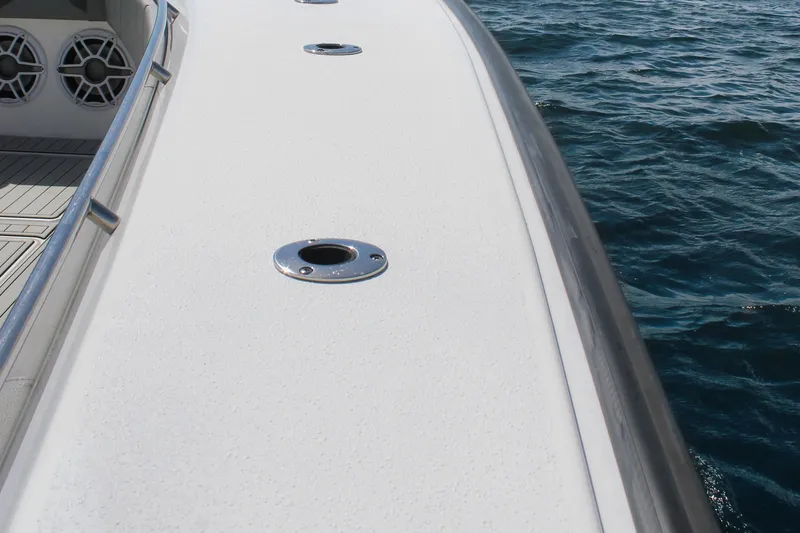 Slide: The Image of 2024 Cape Horn 39 T boat deck with ocean view, featuring sleek design and speakers. - 25