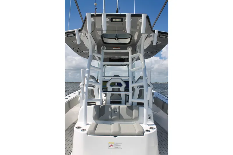 Slide: The Image of 2024 Cape Horn 39 T boat interior with seating and console, ocean backdrop. - 30