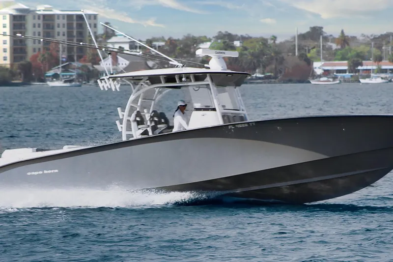 Slide: The Image of 2024 Cape Horn 39 T boat cruising on water, showcasing sleek design and performance. - 35