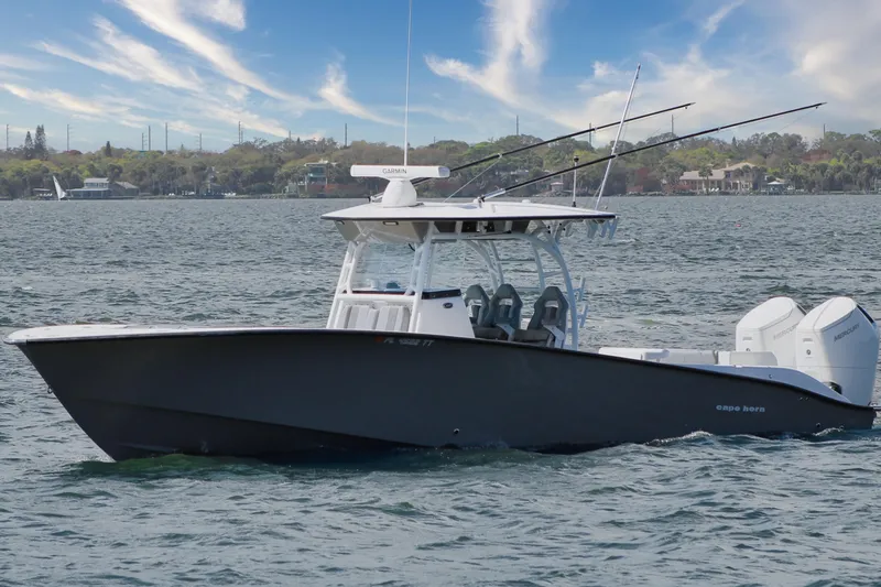 Slide: The Image of 2024 Cape Horn 39 T boat on water with fishing rods and twin engines. - 38
