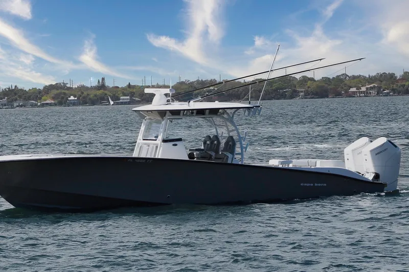 Slide: The Image of 2024 Cape Horn 39 T boat on water, featuring sleek design and powerful engines. - 39