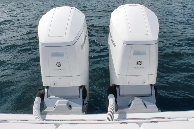 Slide: The Image of 2024 Cape Horn 39 T boat with dual Mercury Verado outboard engines on the water. - 7