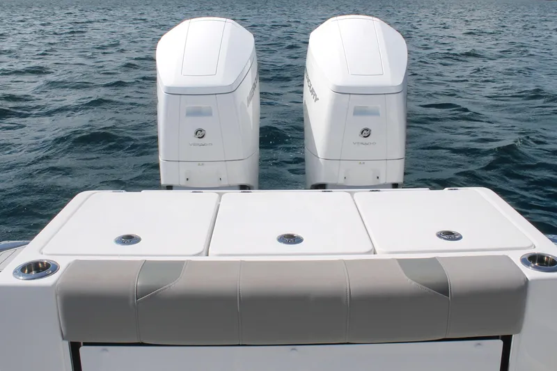 Slide: The Image of 2024 Cape Horn 39 T boat with dual Mercury outboard engines on open water. - 9