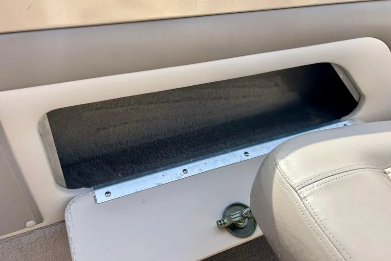 Slide: The Image of Interior storage compartment of a 2000 Lund 1850 Tyee Gran Sport boat. - 28