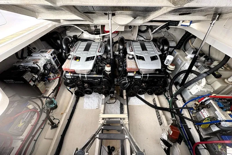 Slide: The Image of Engine room of 2010 Sea Ray Sundancer 370 with dual engines and equipment. - 15