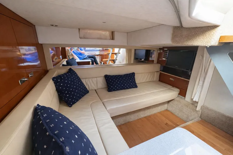 Slide: The Image of Luxurious interior of 2010 Sea Ray Sundancer 370 yacht with leather seating and modern amenities. - 9