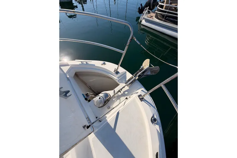 Slide: The Image of Bow of 2020 Jeanneau NC 895 boat with anchor and railing in marina. - 20