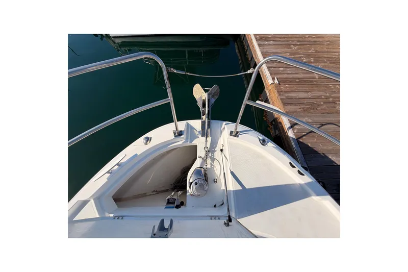 Slide: The Image of Bow view of 2020 Jeanneau NC 895 boat docked at a marina. - 21