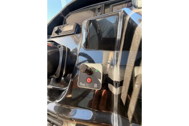 Slide: The Image of Control panel of 2020 Jeanneau NC 895 boat, featuring navigation and control systems. - 50