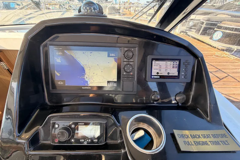 Slide: The Image of Cockpit of 2020 Jeanneau NC 895 with Garmin navigation and Yamaha display systems. - 52