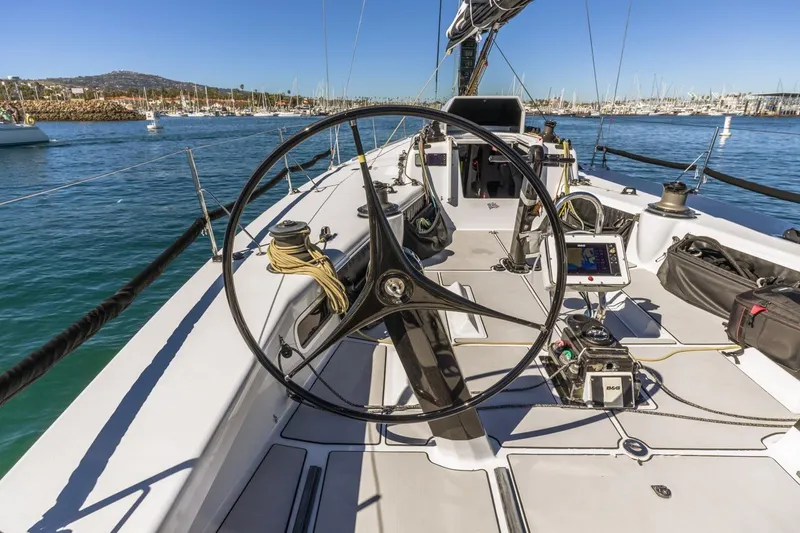 Slide: The Image of Sailing yacht Rogers 46, 2007 model, with steering wheel and navigation equipment on deck. - 12