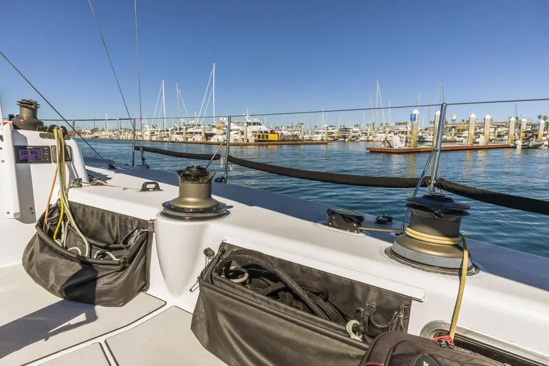 Slide: The Image of Sailboat deck view in marina, Rogers 46 model, 2007, with clear blue sky. - 20