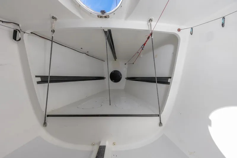 Slide: The Image of Interior view of a 2007 Rogers 46 sailboat, showcasing sleek design and rigging. - 31