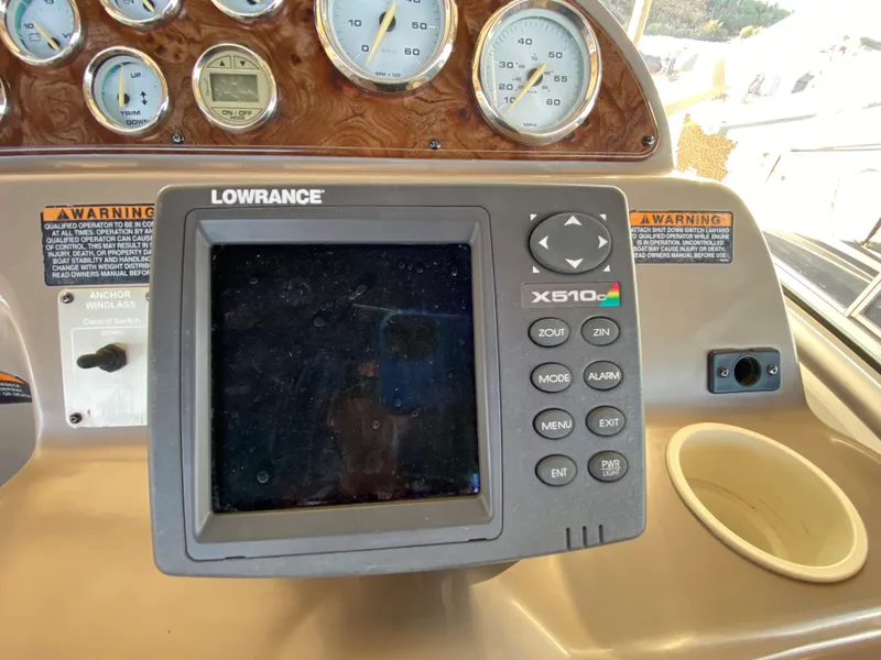 Slide: The Image of Bayliner 265 2003 dashboard with Lowrance X510C display. - 7