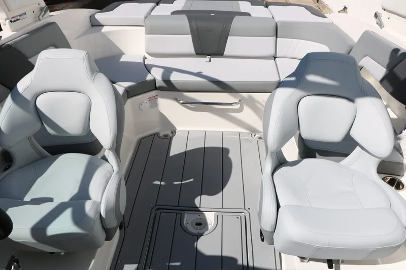 Slide: The Image of 2026 Chaparral 23 SSi interior with gray leather seats. - 24