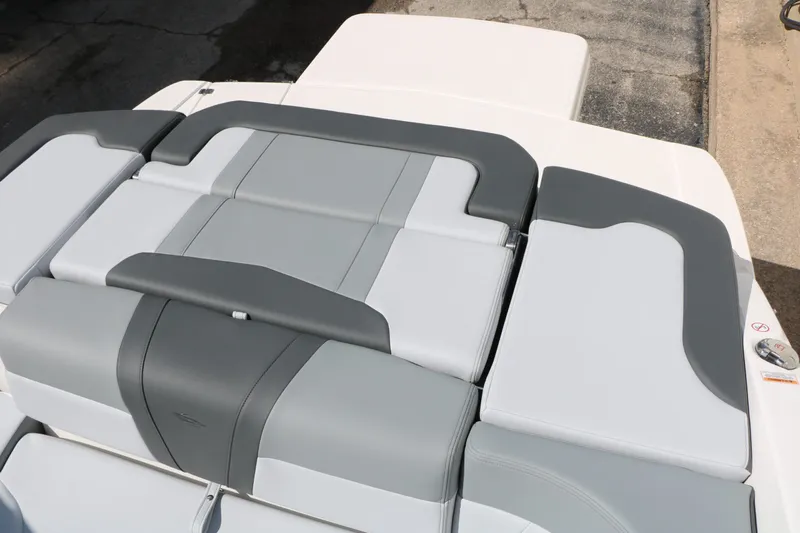 Slide: The Image of Rear view of 2026 Chaparral 23 SSi boat with gray upholstery. - 29