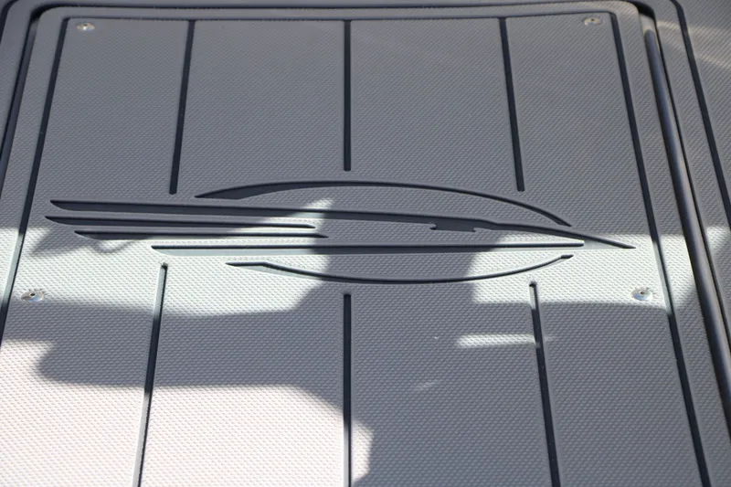 Slide: The Image of Chaparral 23 SSi 2026 boat floor with logo. - 36