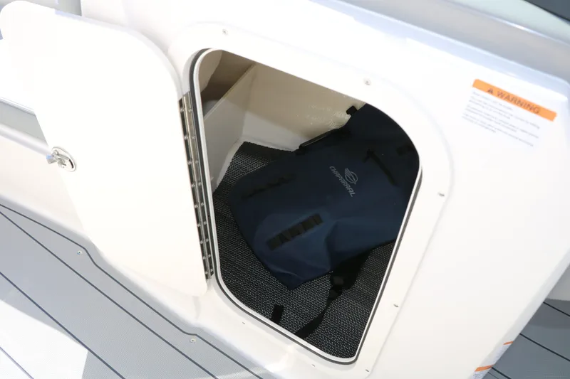 Slide: The Image of Storage compartment in Chaparral 23 SSi boat with bag, 2026 model. - 37