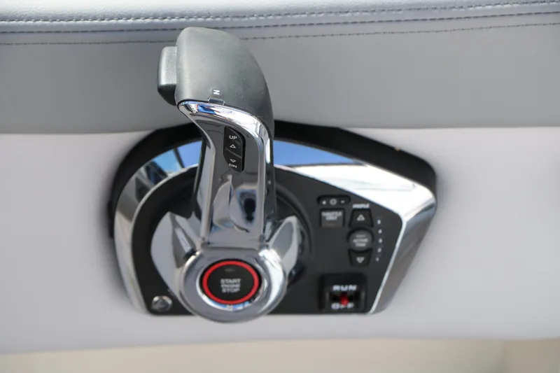 Slide: The Image of 2026 Chaparral 23 SSi boat control with start-stop button. - 38