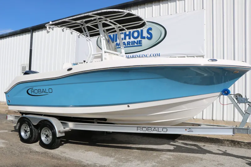 Slide: The Image of 2026 Robalo R200 Center Console boat on trailer. - 3