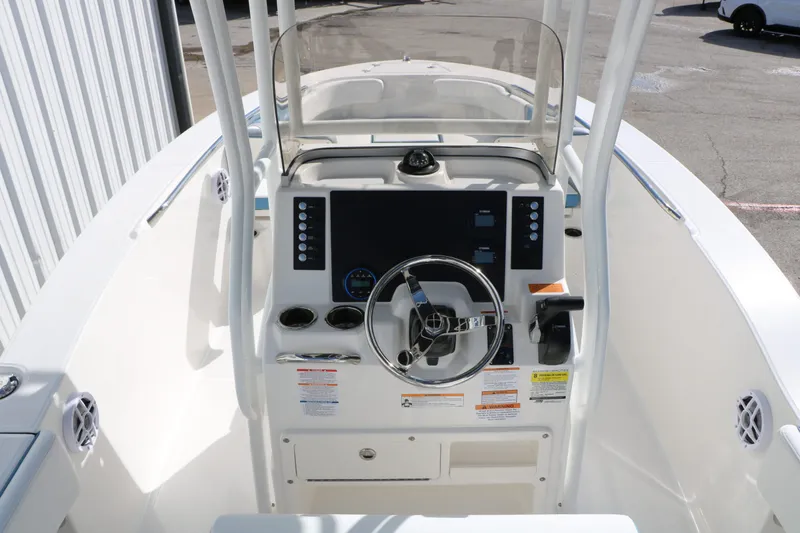 Slide: The Image of Robalo R200 Center Console 2026 helm with modern features. - 30