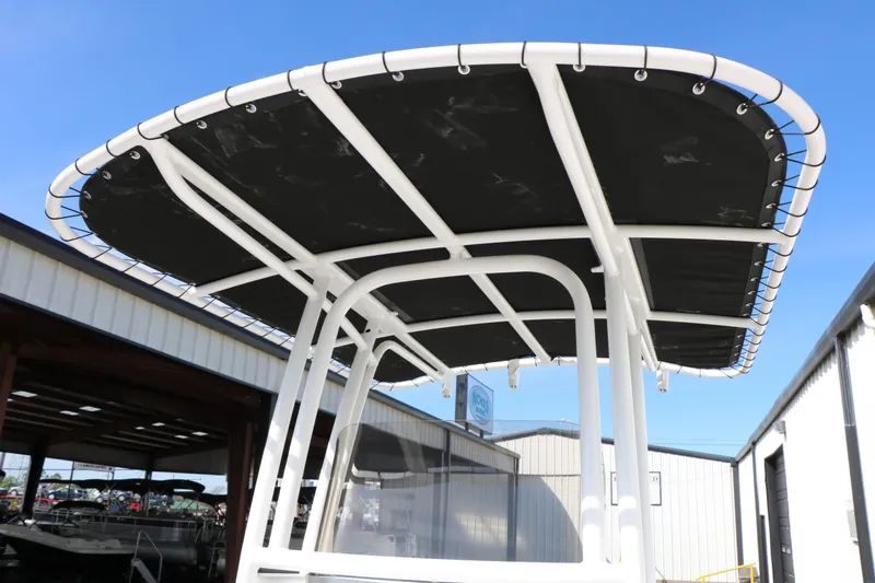 Slide: The Image of 2026 Robalo R200 Center Console boat with black sunshade. - 35