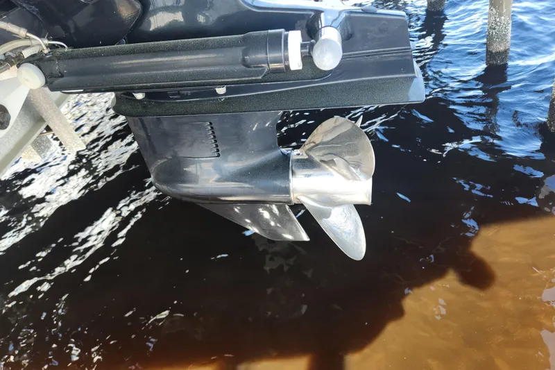 Slide: The Image of 2018 Stingray 235 LR boat propeller in water, close-up view. - 69