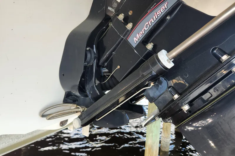 Slide: The Image of 2018 Stingray 235 LR boat with MerCruiser engine detail. - 72