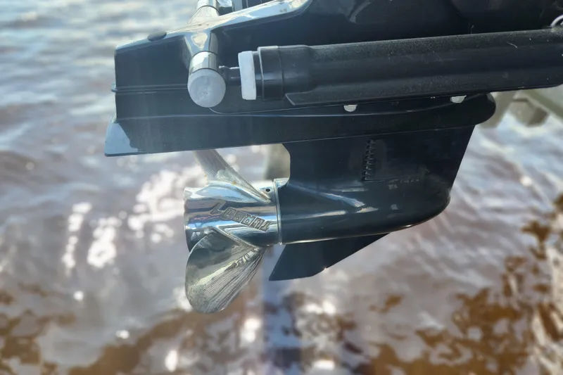 Slide: The Image of Close-up of a 2018 Stingray 235 LR boat propeller in water. - 78