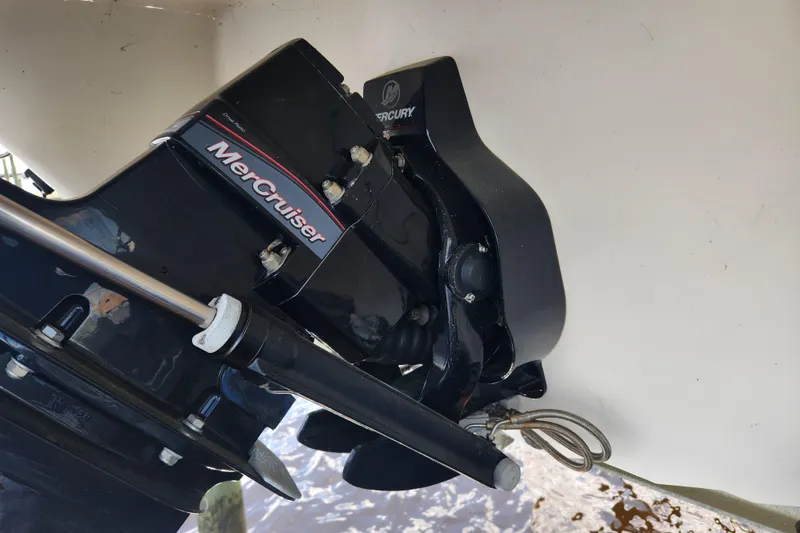 Slide: The Image of MerCruiser engine on a 2018 Stingray 235 LR boat, close-up view. - 80