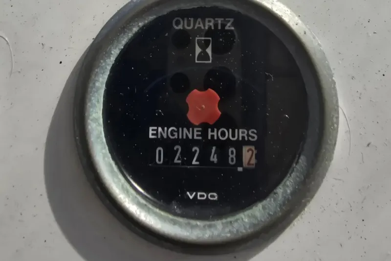 Slide: The Image of Quartz engine hour meter showing 2248 hours on President 58, 1996 model. - 20