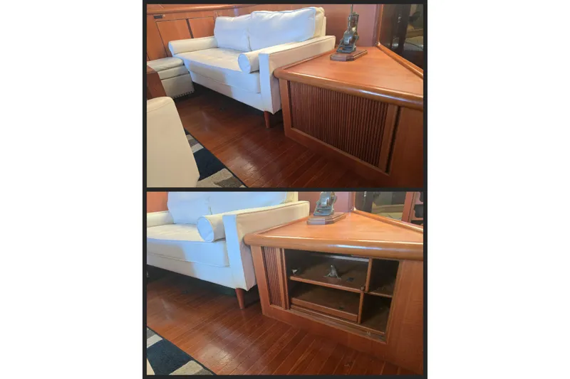 Slide: The Image of White sofa and wooden cabinet in a 1996 President 58 yacht interior. - 27