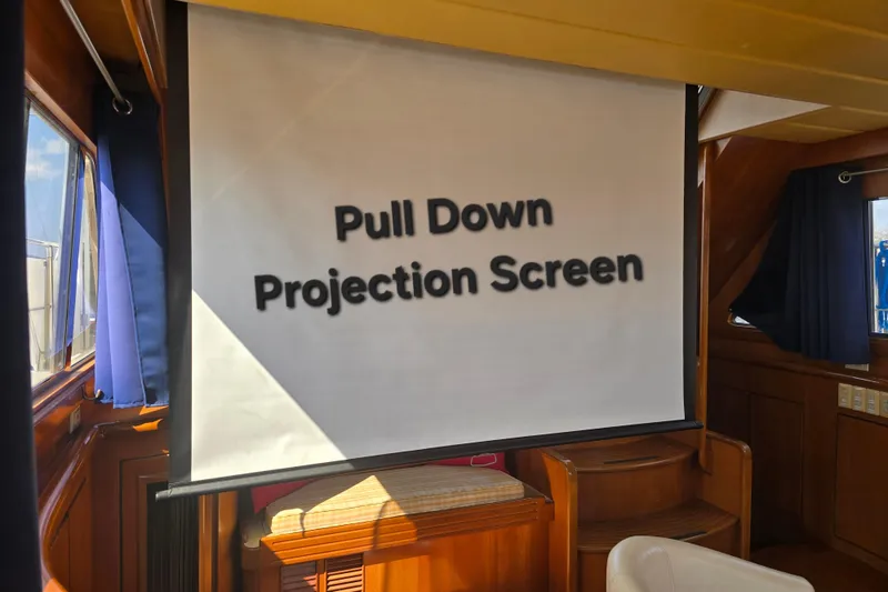 Slide: The Image of Pull-down projection screen inside a 1996 President 58 yacht cabin. - 30