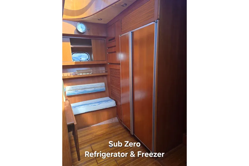 Slide: The Image of Luxurious 1996 President 58 yacht interior with Sub Zero refrigerator and freezer. - 33