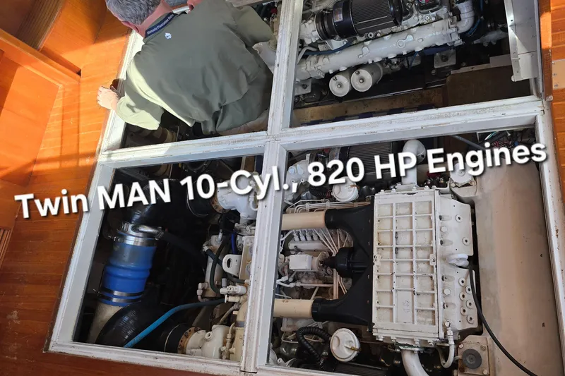 Slide: The Image of Engine room of a 1996 President 58 yacht with twin MAN 10-cylinder, 820 HP engines. - 53